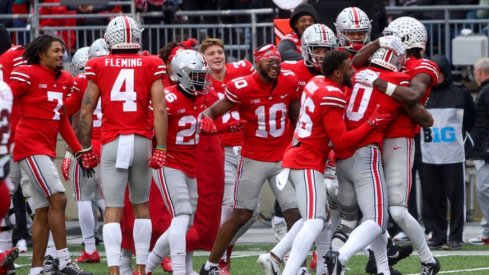 Ohio State's Kamryn Babb celebrates with his team.